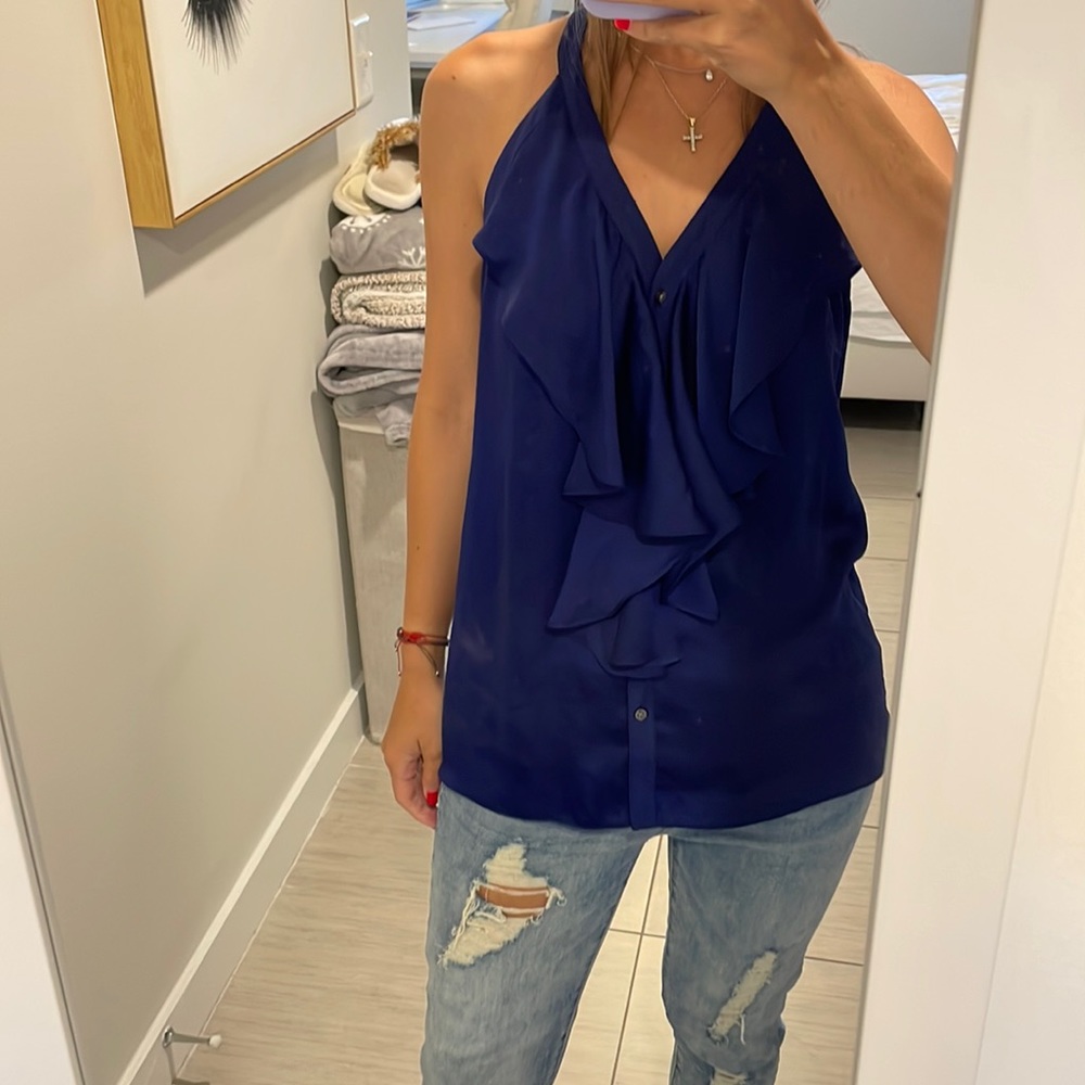 Super cute Ann Taylor Blouse! Love the color for the spring. Barely used.